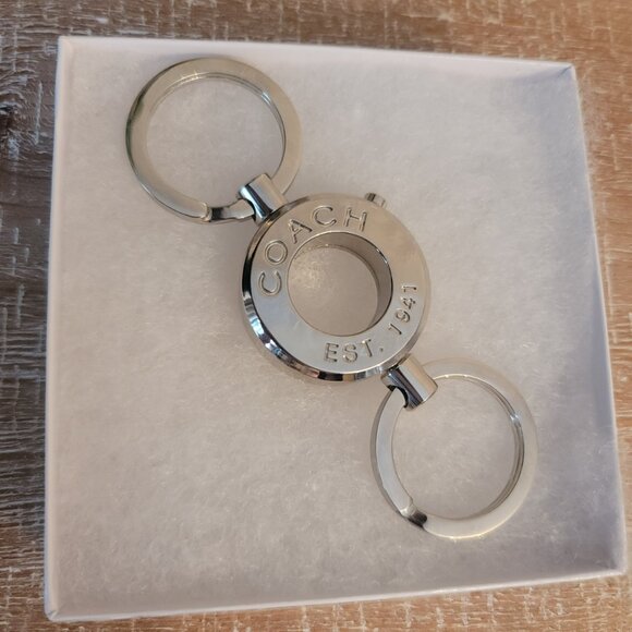 COACH -  Valet Keychain. Brand new. Silver toned key rings with open center. - Picture 1 of 7